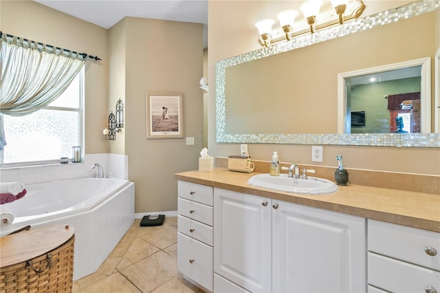 bathroom featuring a bath, baseboards, vanity, and tile patterned floors