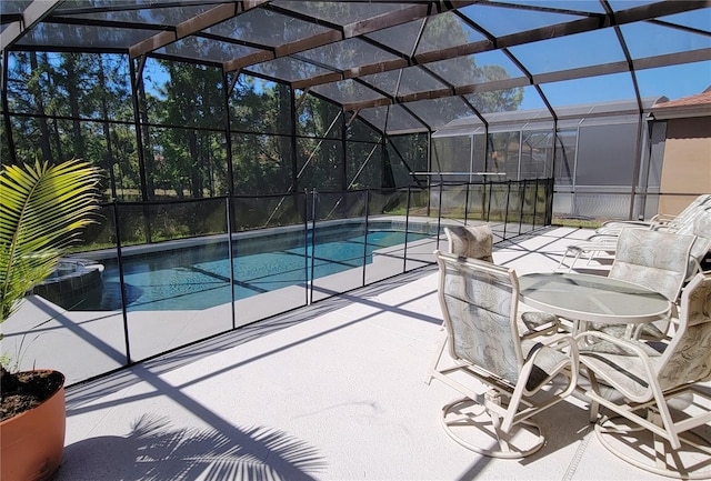 view of pool featuring a lanai and a patio area