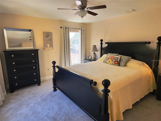 bedroom with ceiling fan and carpet