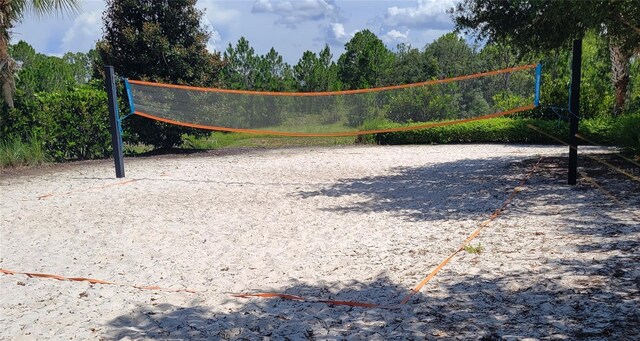 view of home's community with volleyball court