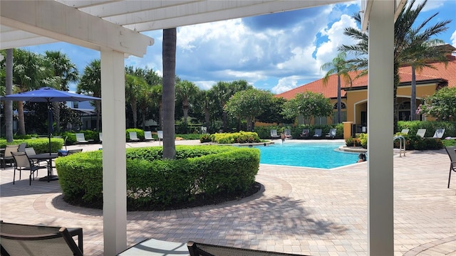 community pool featuring a patio