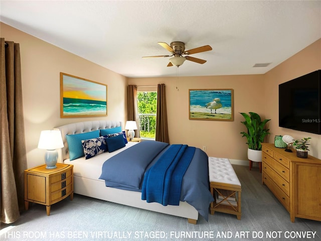 carpeted bedroom with ceiling fan