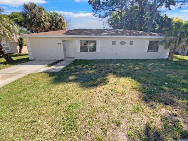 single story home with a front yard