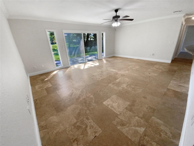 unfurnished room featuring ceiling fan and crown molding