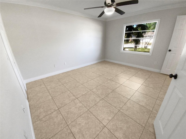 unfurnished room with ceiling fan, light tile patterned floors, and crown molding