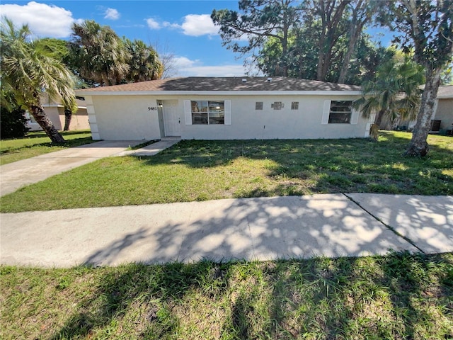 ranch-style house with a front yard