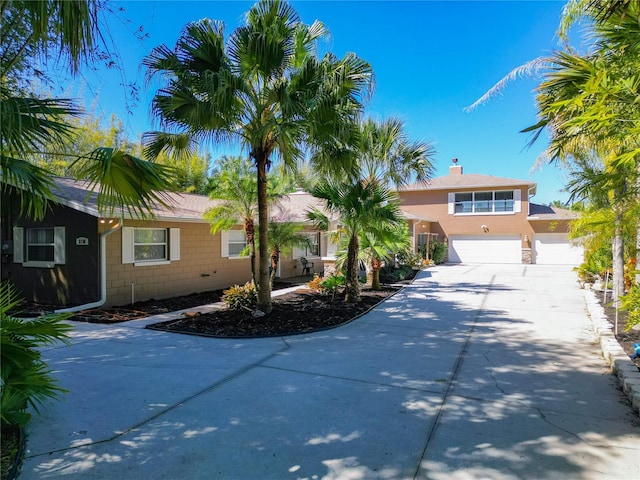 view of front of property with a garage