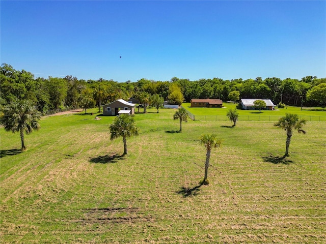 view of yard with a rural view