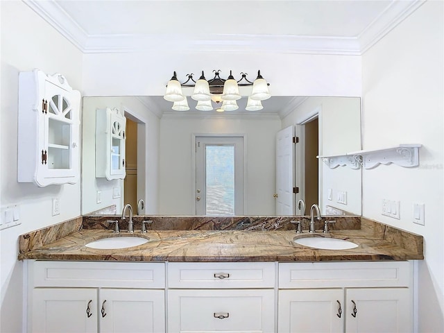 bathroom with vanity and ornamental molding