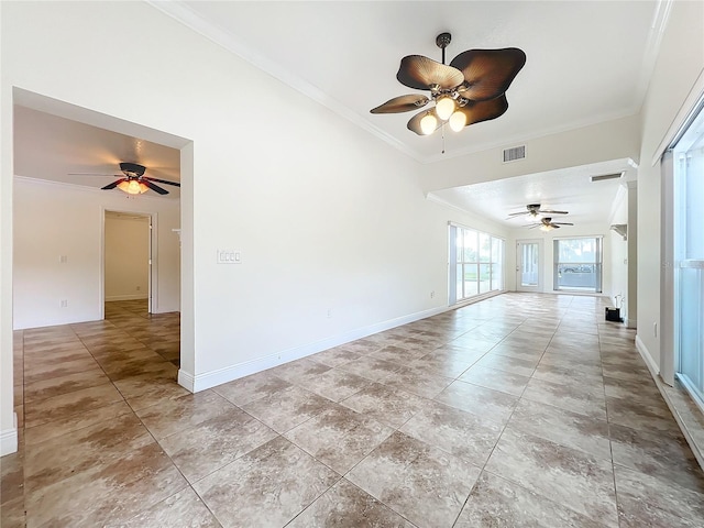 empty room featuring ceiling fan and ornamental molding