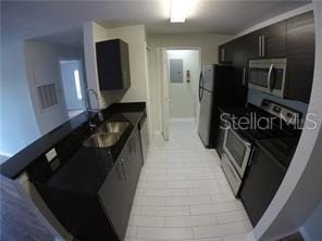 kitchen with appliances with stainless steel finishes and sink