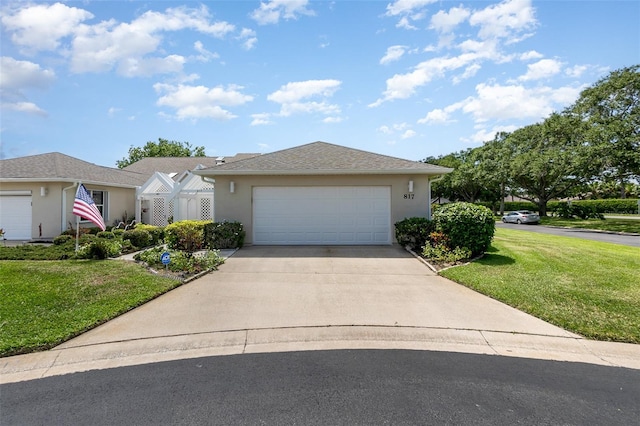 ranch-style house with a front lawn and a garage