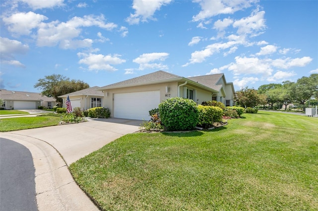 view of front facade featuring a front lawn and a garage