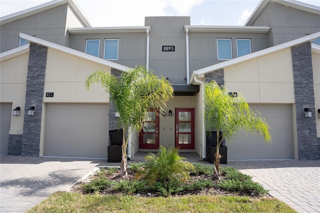 view of front of property with a garage