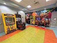 playroom featuring a paneled ceiling