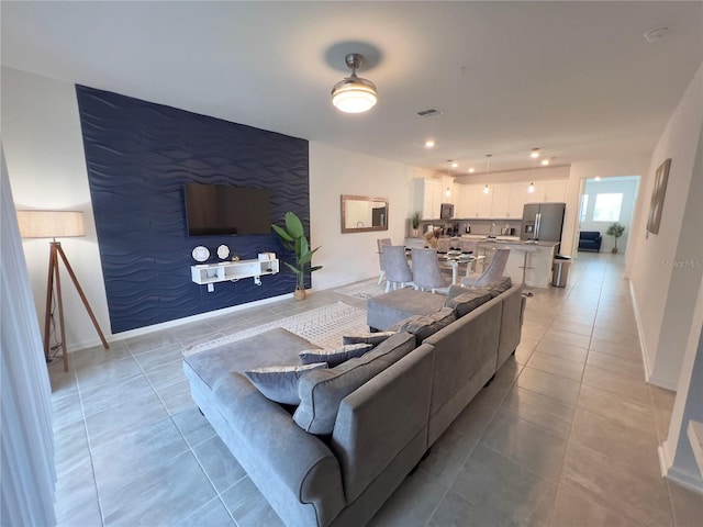 living room featuring light tile patterned floors