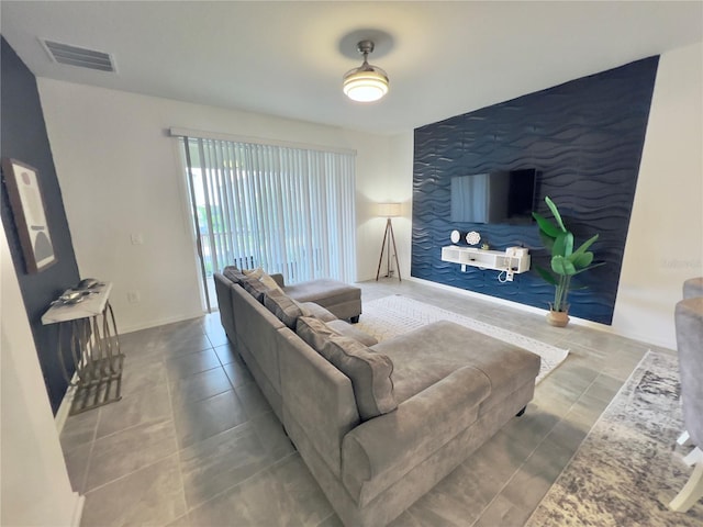 living room featuring tile patterned floors