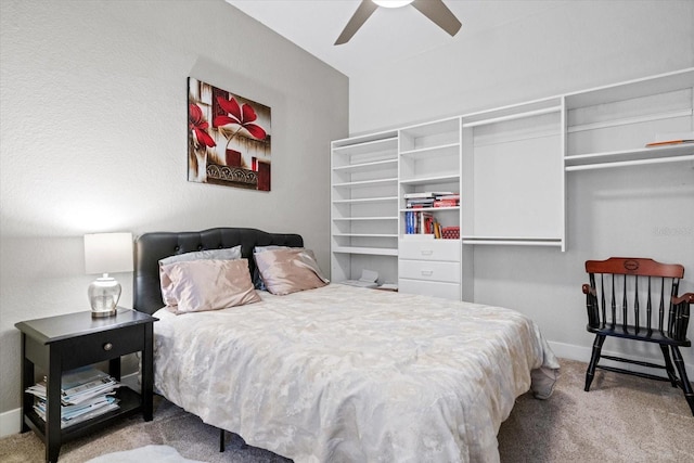 bedroom featuring a closet, light carpet, and ceiling fan