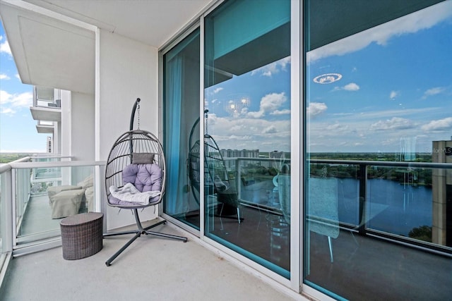 balcony featuring a water view