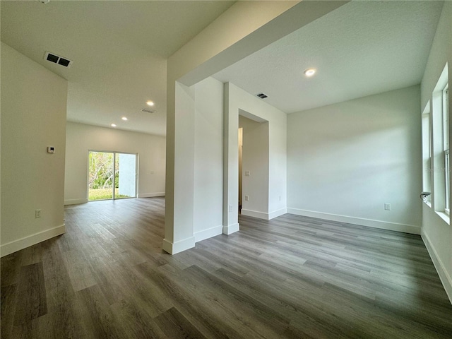 empty room featuring hardwood / wood-style flooring