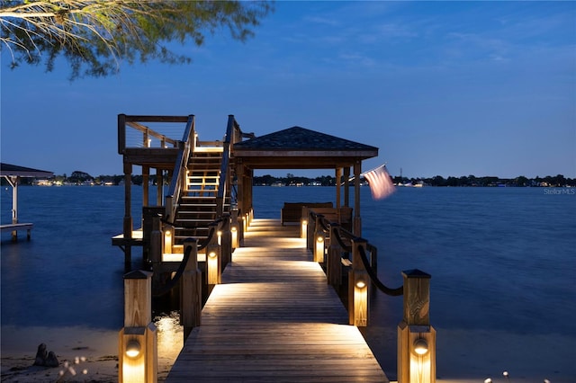 view of dock with a water view