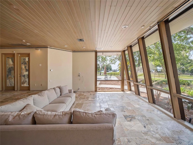 sunroom featuring wood ceiling