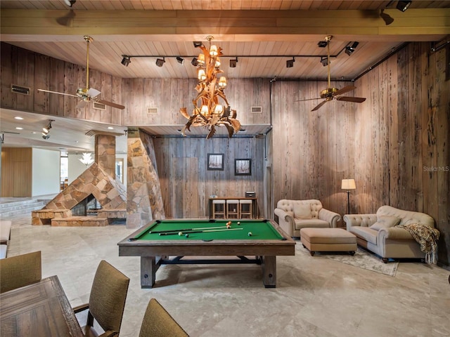 rec room featuring track lighting, wooden walls, pool table, and wooden ceiling