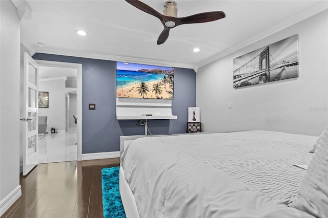 bedroom featuring crown molding, ceiling fan, and dark hardwood / wood-style flooring