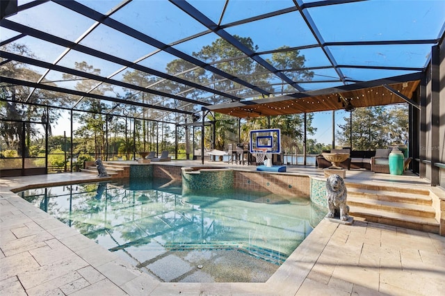 view of swimming pool featuring a patio and glass enclosure