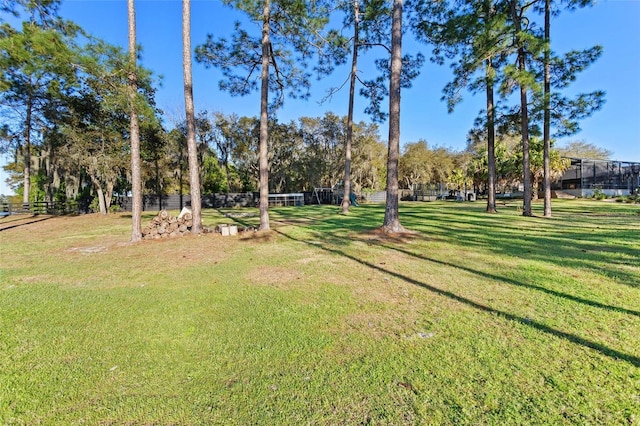 view of home's community with a lawn