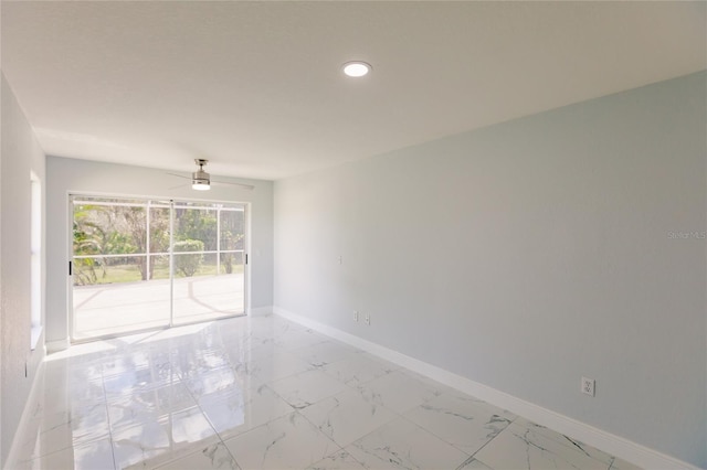 unfurnished room with ceiling fan