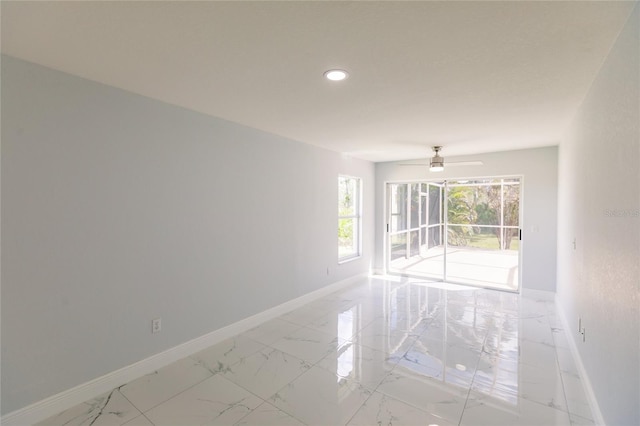 empty room featuring ceiling fan