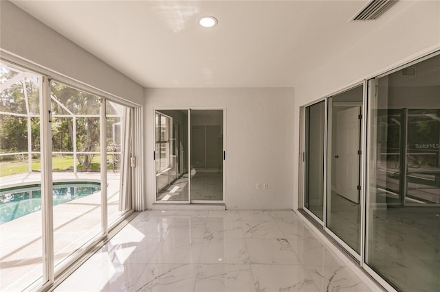 view of unfurnished sunroom