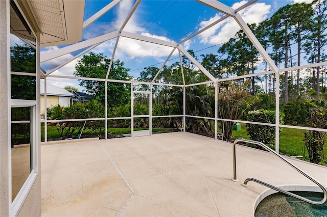 view of patio with a lanai