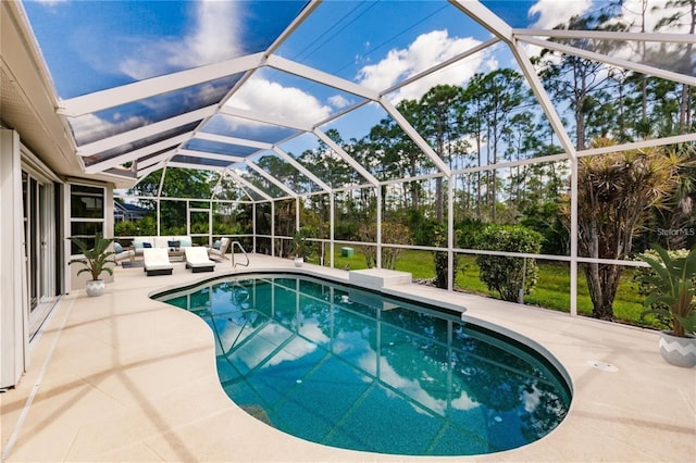 view of pool featuring a patio, a lanai, and outdoor lounge area