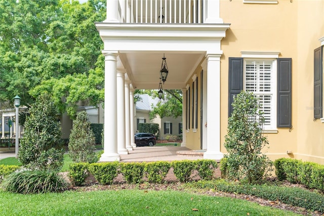 doorway to property featuring a balcony