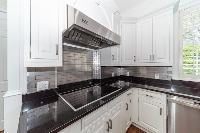 kitchen featuring white cabinetry, black electric stovetop, dishwasher, and wall chimney range hood