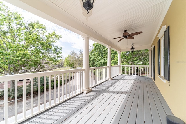 wooden deck with ceiling fan