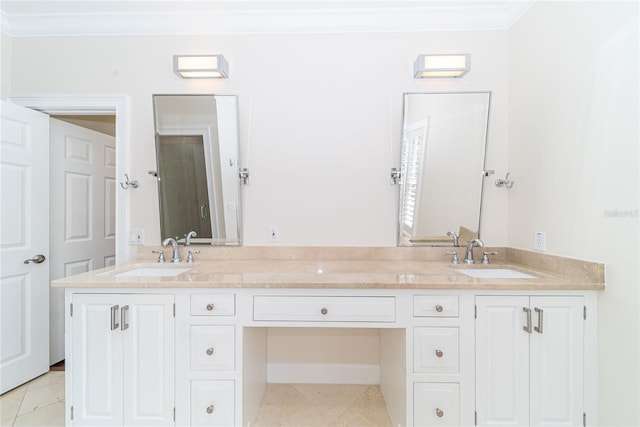 bathroom featuring ornamental molding, dual bowl vanity, and tile flooring