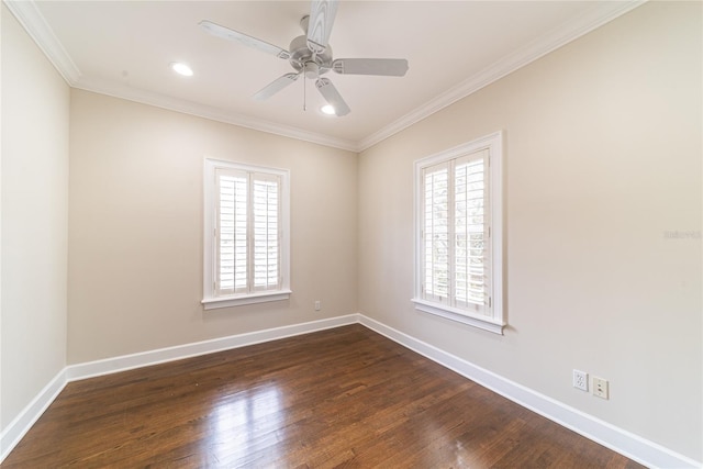 spare room with crown molding, ceiling fan, and dark hardwood / wood-style flooring