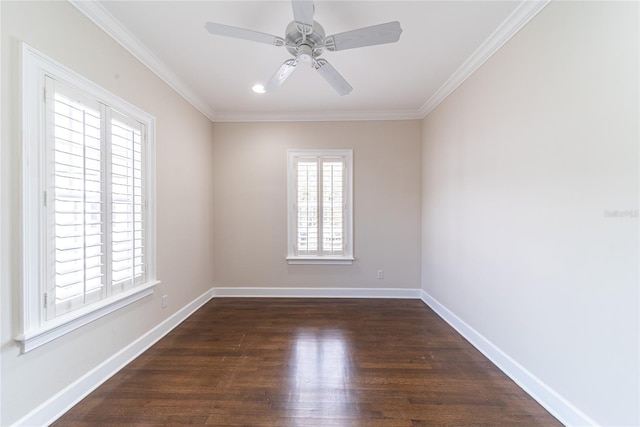 spare room featuring crown molding, ceiling fan, and dark hardwood / wood-style flooring