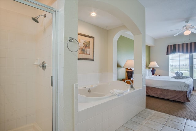 bathroom with independent shower and bath, tile floors, and ceiling fan