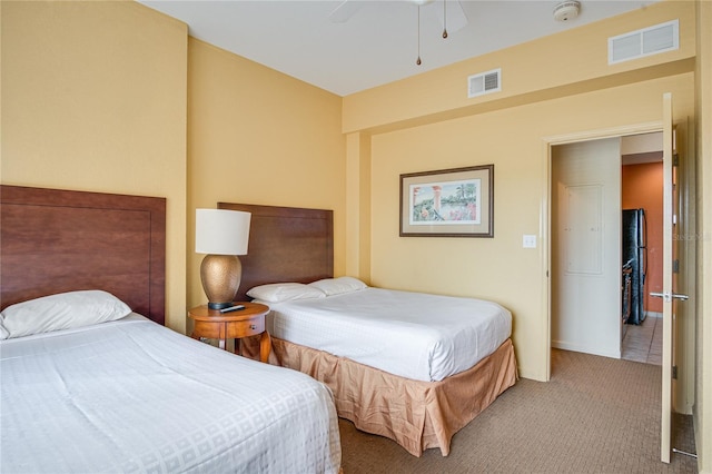 carpeted bedroom with ceiling fan