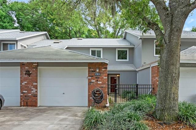 view of front of property featuring a garage