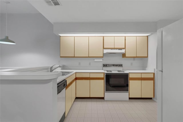 kitchen with hanging light fixtures, sink, kitchen peninsula, and white appliances