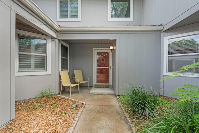 property entrance featuring a patio