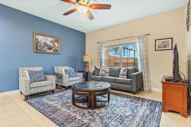 living room with ceiling fan and light tile floors