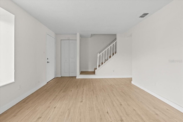 empty room featuring light hardwood / wood-style floors