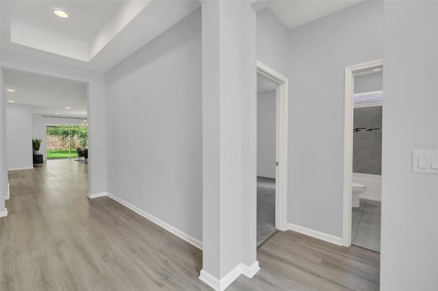 corridor featuring light hardwood / wood-style flooring