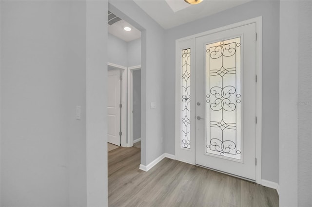 foyer entrance featuring light hardwood / wood-style floors